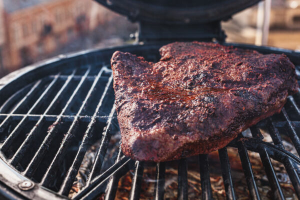 1855 black angus beef on a grill